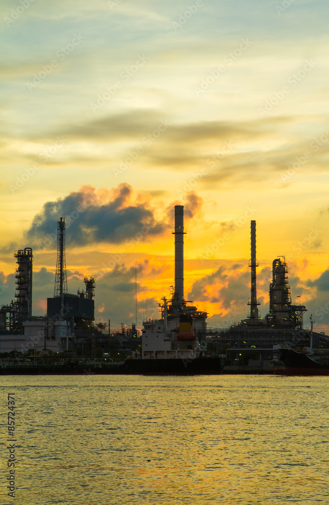 Oil refinery along the river at Dusk (Bangkok, Thailand)