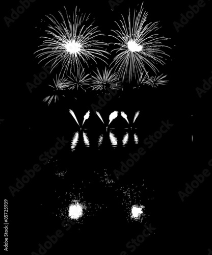 fireworks with reflection on lake