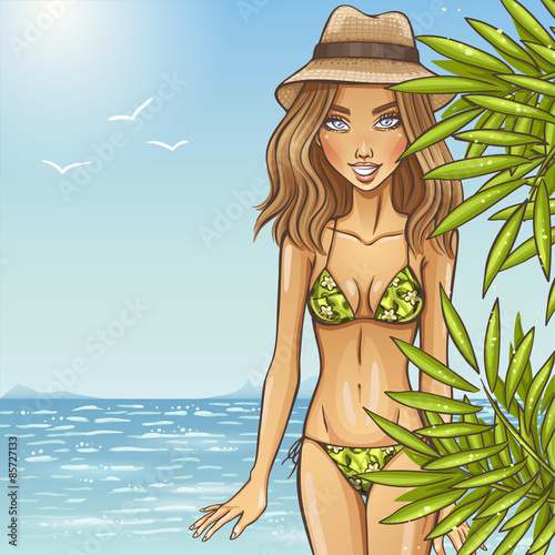 Beautiful girl in bikini on the beach