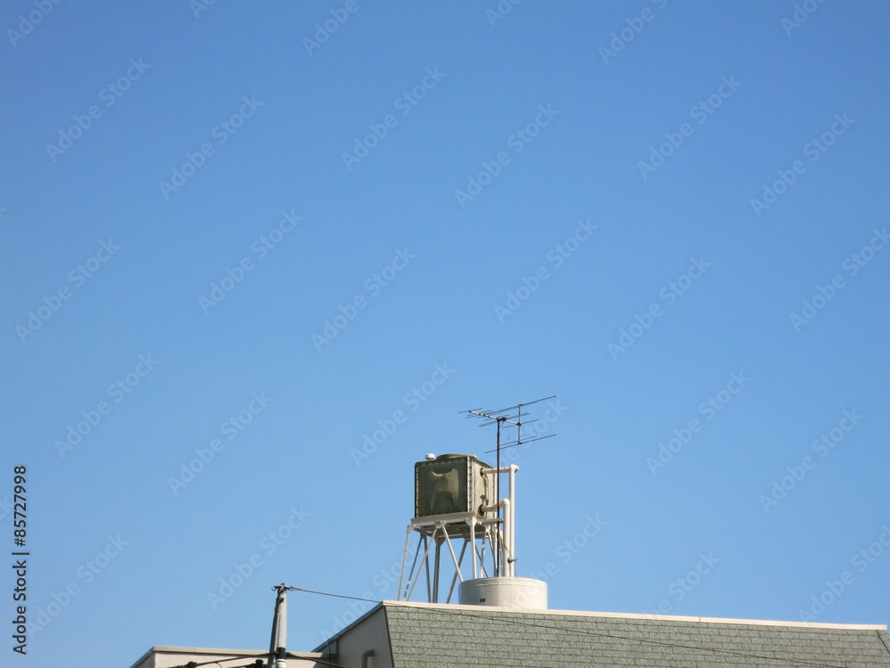 a water tank on top of apartment in Japan a water tank on top of apartment in Japan
