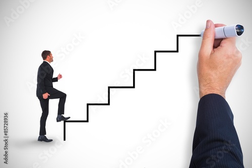 Composite image of businessman walking with his leg up 