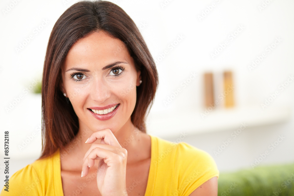 Confident woman toothy smiling at the camera Confident woman toothy smiling at the camera