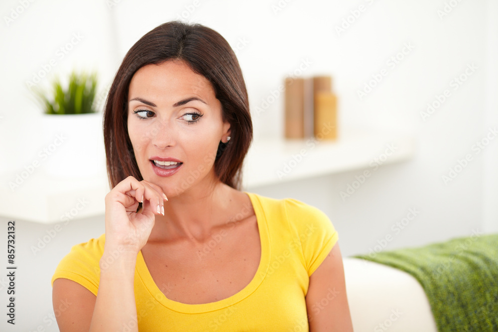 Beautiful woman looking away from the camera Beautiful woman looking away from the camera
