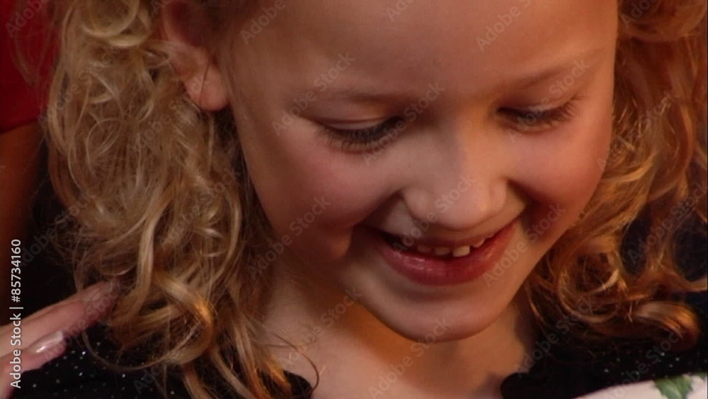 Young girl with present at Christmas. Young girl with present at Christmas.