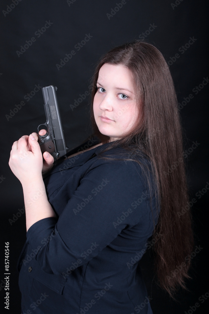 woman posing with guns.