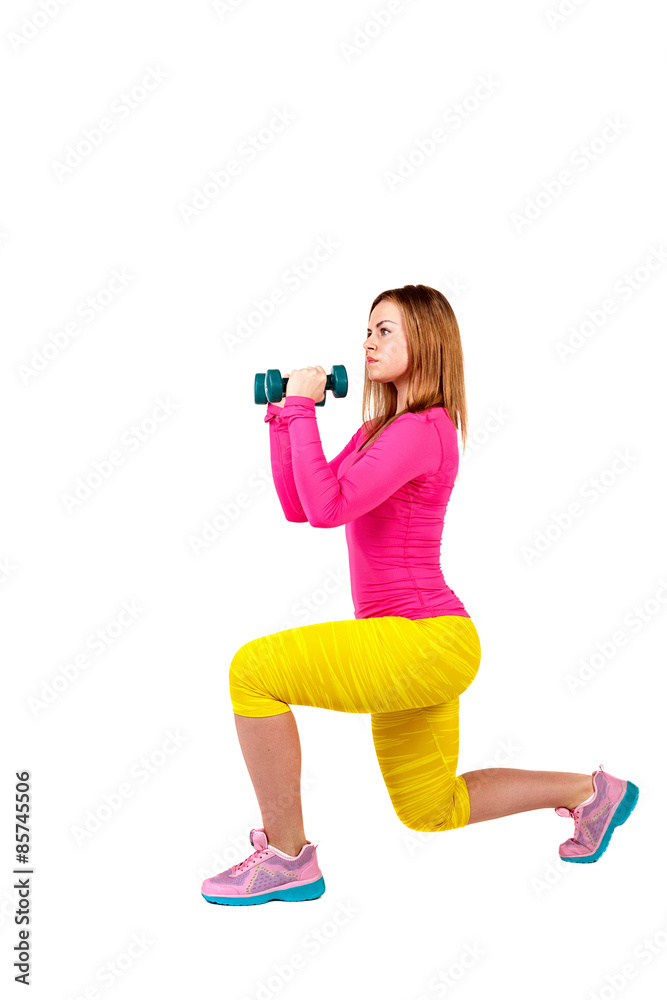 Athlete squats with dumbbells. Athlete squats with dumbbells.