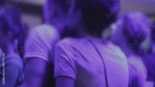 Two young homosexual men hugging, gay couple dancing, nightclub