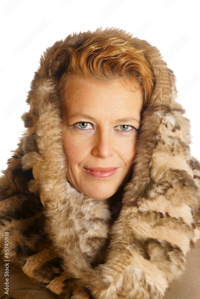 Blond caucasian woman with ecologic fur hood Blond caucasian woman with ecologic fur hood
