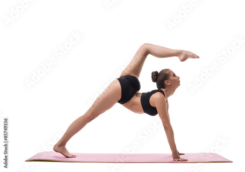 Yoga. Image of harmonous girl showing exercise
