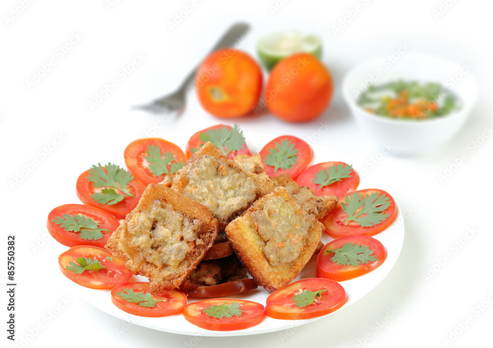 Fried bread with minced pork spread on white background. Fried bread with minced pork spread on white background.