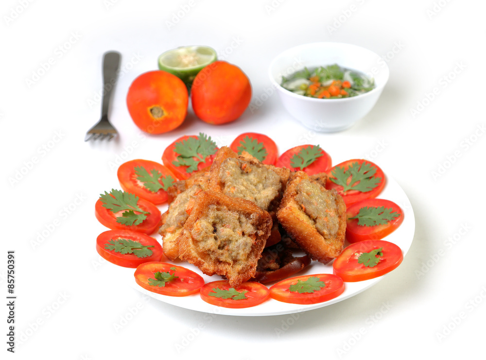 Fried bread with minced pork spread on white background.