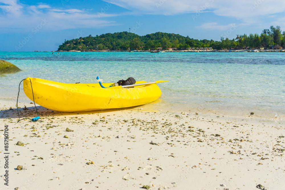 Yellow kayak on the sea. Kayaking on island Yellow kayak on the sea. Kayaking on island