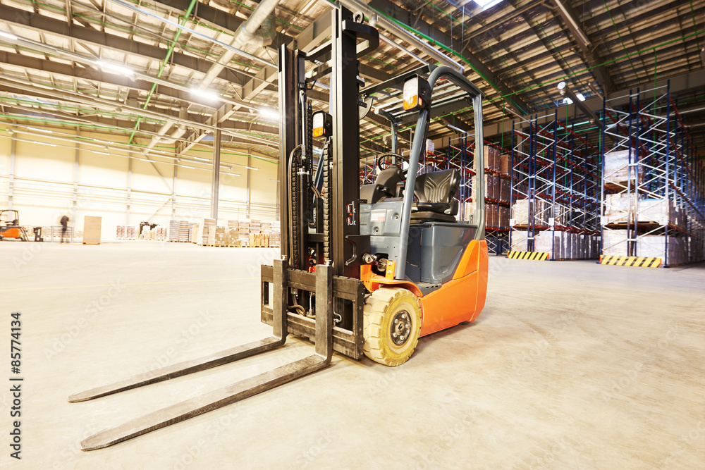 forklift loader stacker truck at warehouse