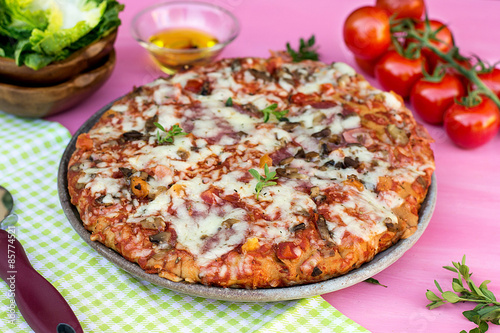 American style pizza with salami and mushrooms