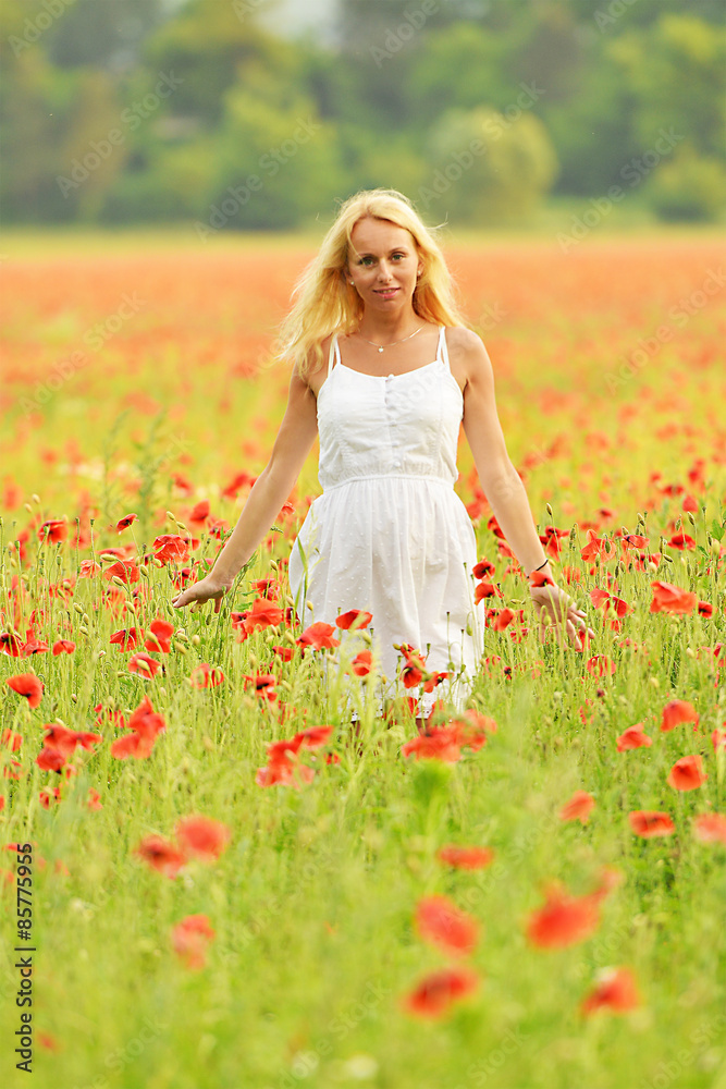 happy pregnant woman in poppie field happy pregnant woman in poppie field