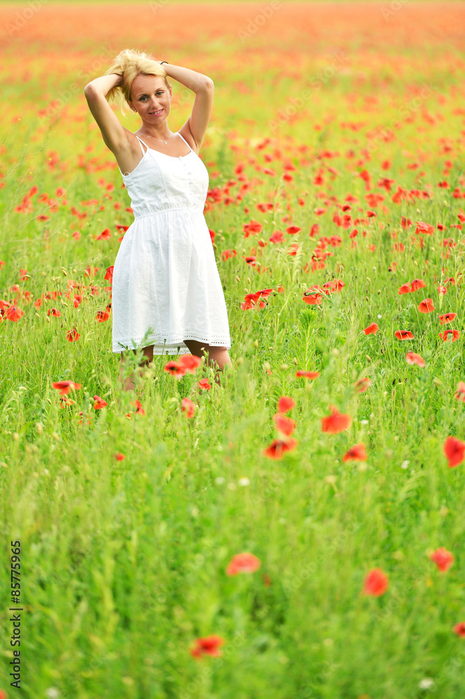 happy pregnant woman in poppie field happy pregnant woman in poppie field