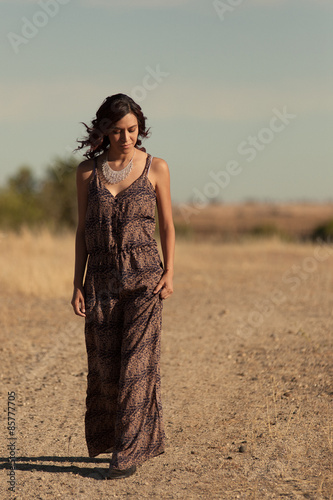 Young female model outdoors in stylish jumpsuit