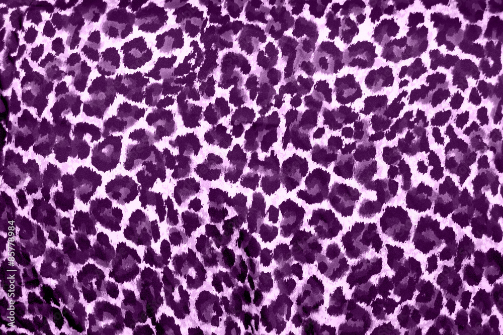 Naklejka premium Beautiful purple leopard animal print fur background / wallpaper
