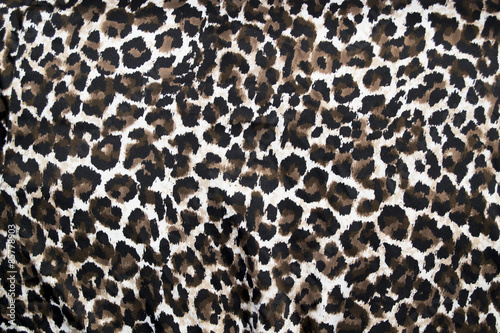 Beautiful leopard animal print fur background / wallpaper