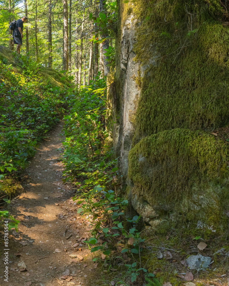 Hiker Climbs Granite Boulders Hiker Climbs Granite Boulders