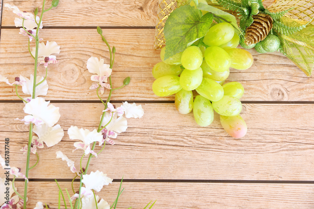 Portion of fresh Green Grapes on vintage wooden background