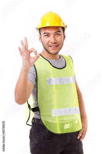 construction worker showing ok hand sign gesture on white backgr © 9nong