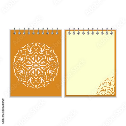 Orange cover notebook with round florwer pattern