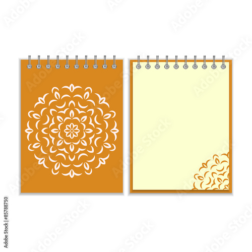 Spiral orange cover notebook with round ornate pattern