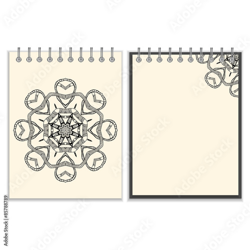 White cover notebook with handmade black pattern