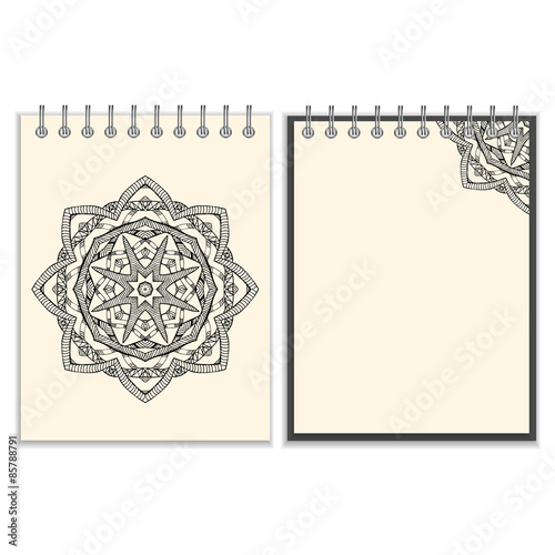 White cover notebook with handmade black pattern