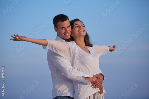 happy young romantic couple have fun arelax relax at home