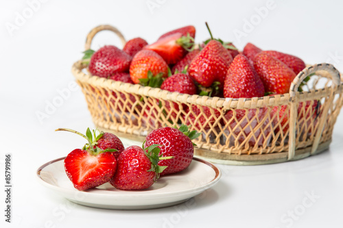 Strawberry with leaf on white background