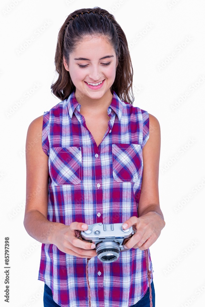 Pretty brunette holding photo camera Pretty brunette holding photo camera