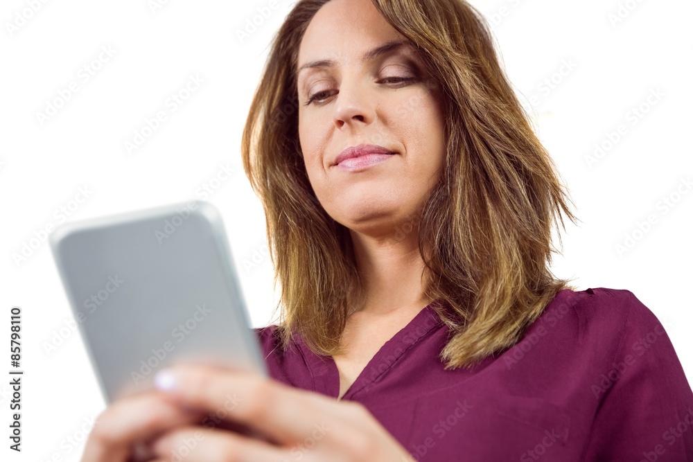 Fototapeta premium Pretty brunette sending a text message