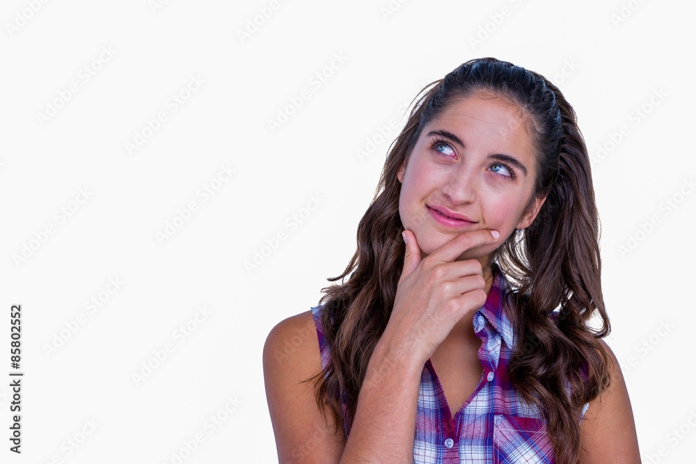 Happy pretty woman with finger on chin Happy pretty woman with finger on chin