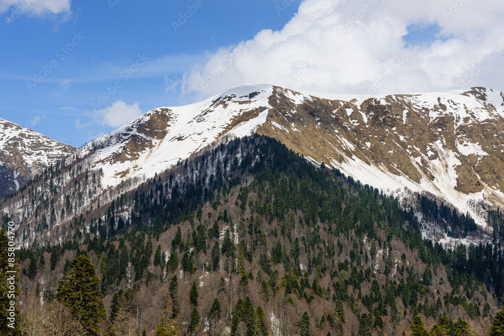 High Caucasian mountains covered with snow, near the ski resort Rosa Khutor, Sochi, Russia.