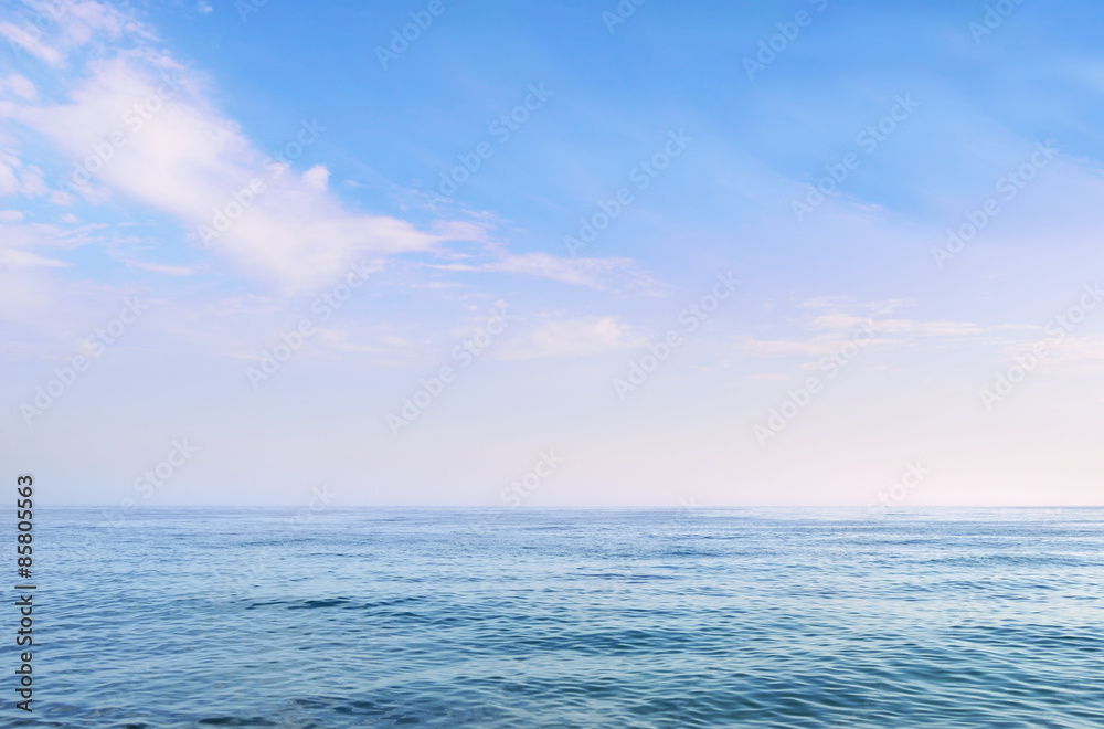 clear blue sea under a beautiful cloudy sky