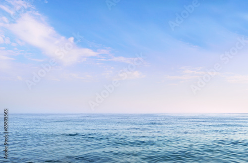 clear blue sea under a beautiful cloudy sky © art_vor