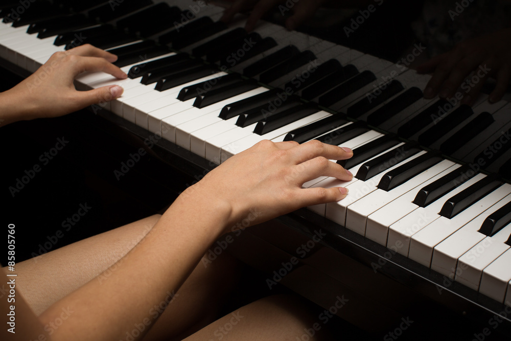 Playing piano Stock Photo | Adobe Stock