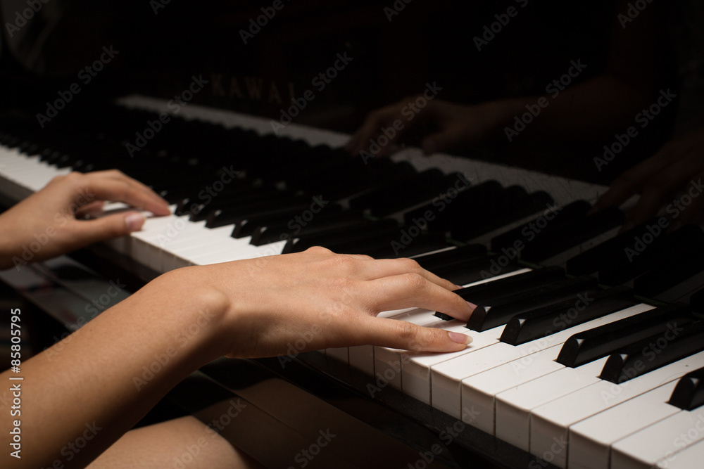 Fototapeta premium Playing piano