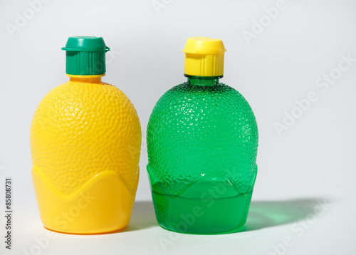 An image of two plastic bottles on white backgound