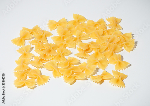 An image of pasta farfalle on white background
