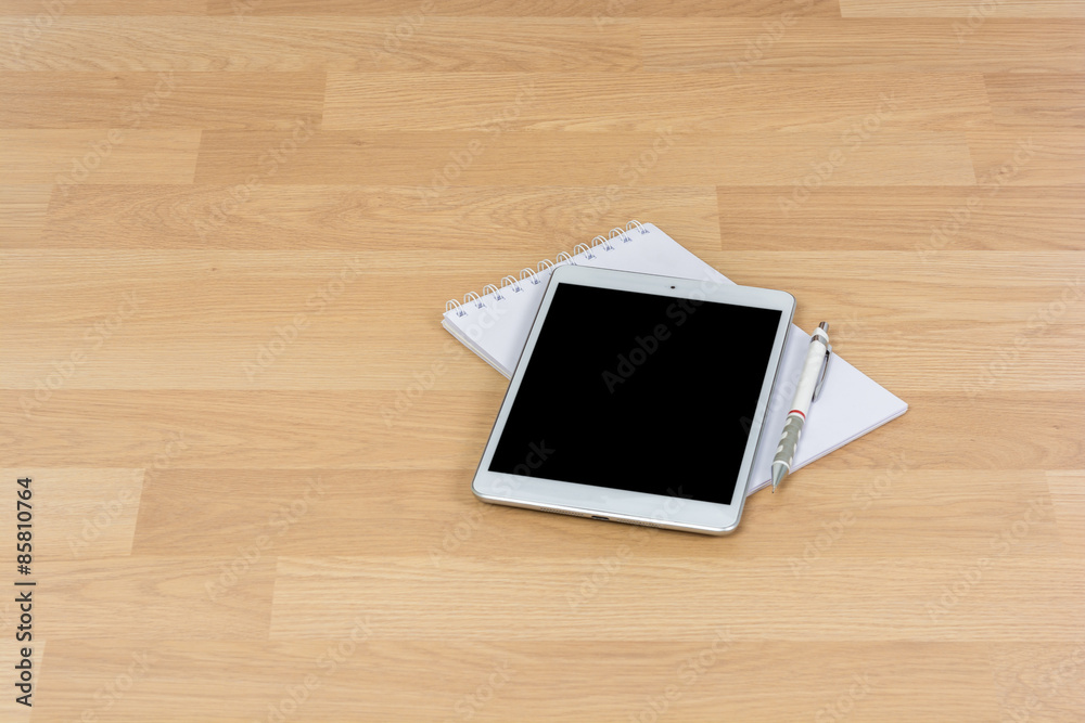 White digital Tablet on wooden White digital Tablet on wooden