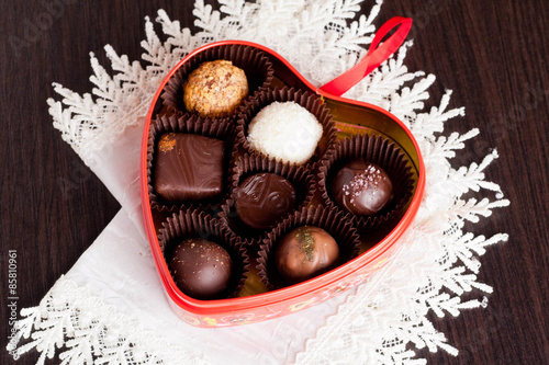 Chocolate candies in heart shape box