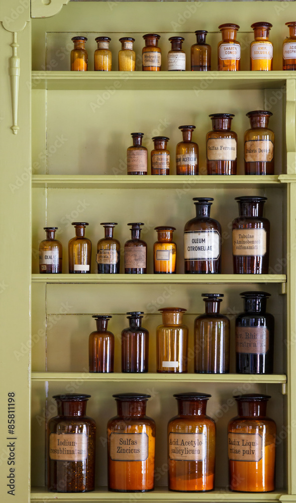 Old apothecary cabinet with storage jars