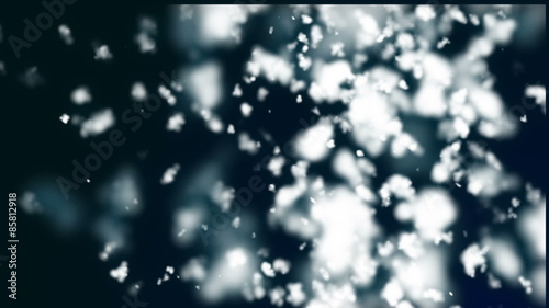 Looped dark blue background with white small glowing clouds