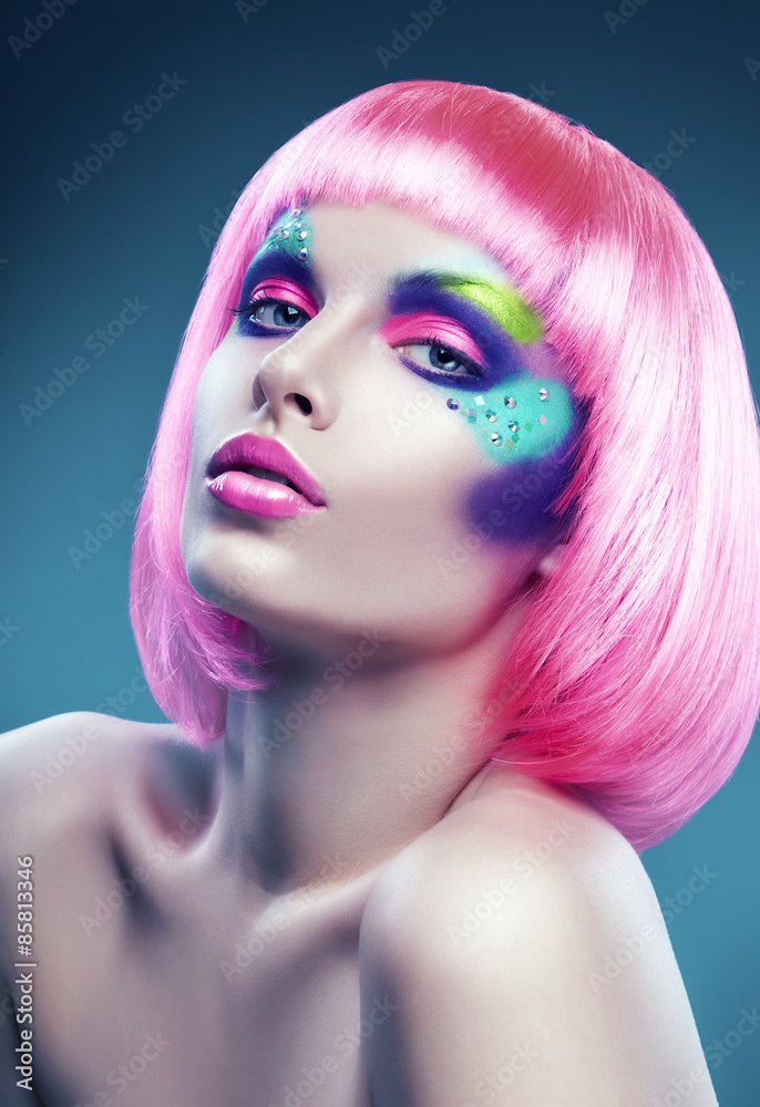 woman with pink hair and colourful make-up woman with pink hair and colourful make-up