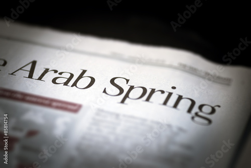 Arab Spring written newspaper. photo