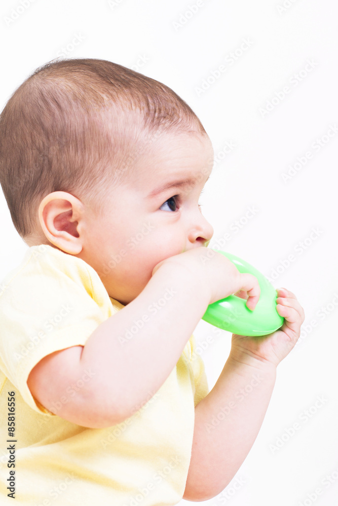 Beautiful baby playing with colorful toy
Beautiful baby playing with colorful toy