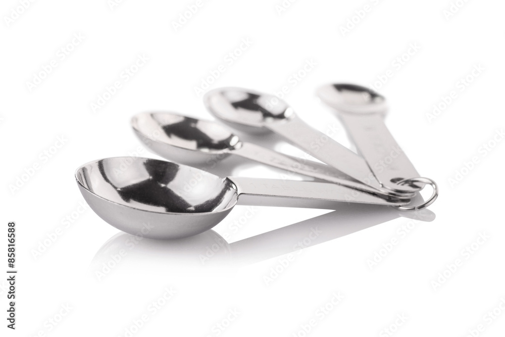set of Measuring Spoons isolated on table set of Measuring Spoons isolated on table